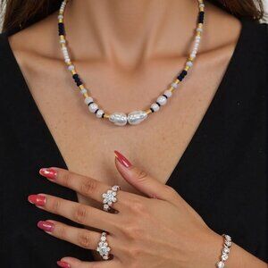 Classic Navy and Pearls . Dressy medium length beaded pearl and navy choker